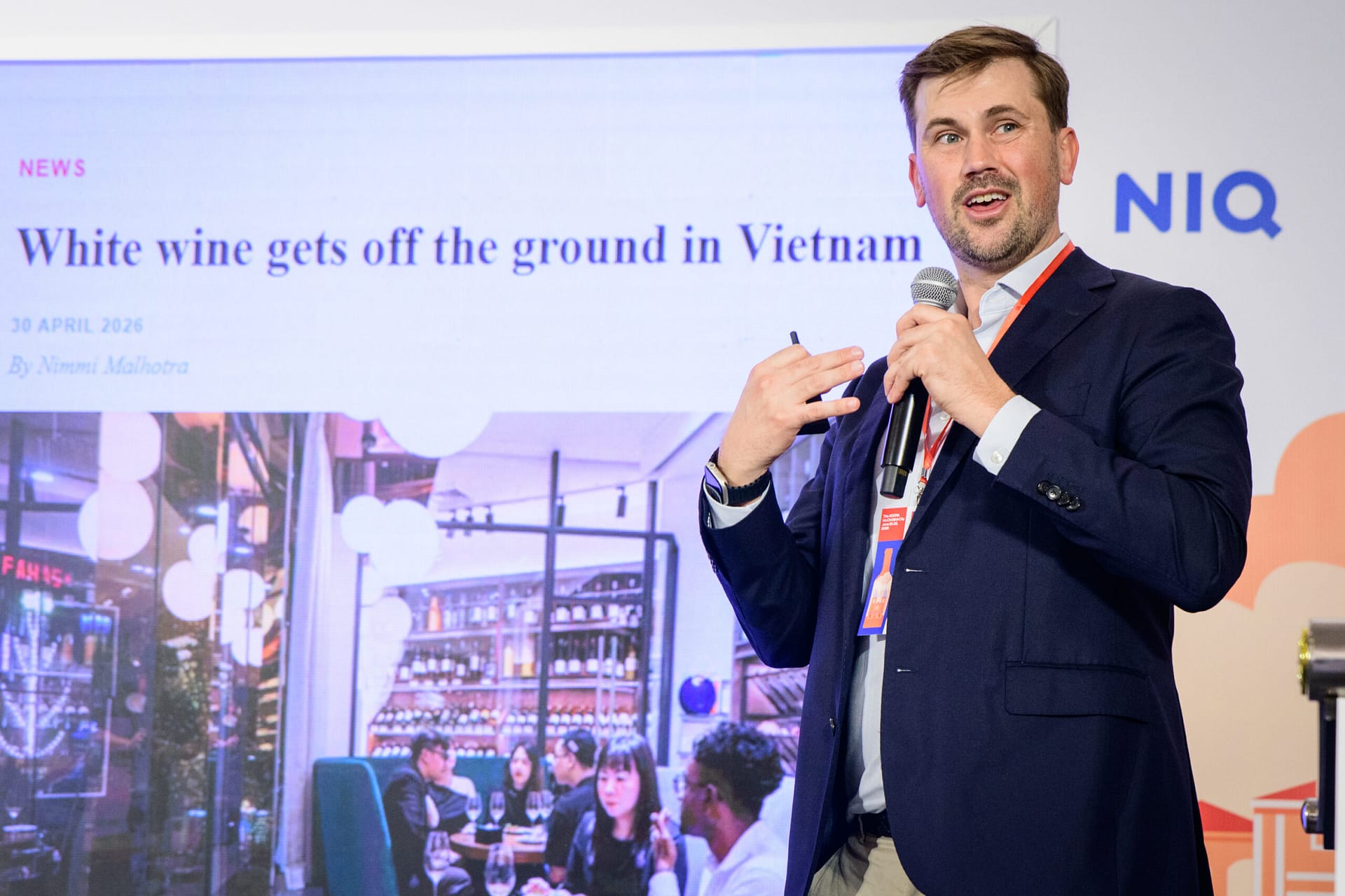 James Phillips presenting NielsenIQ OPUS survey data at Wines Experience HCMC 2026