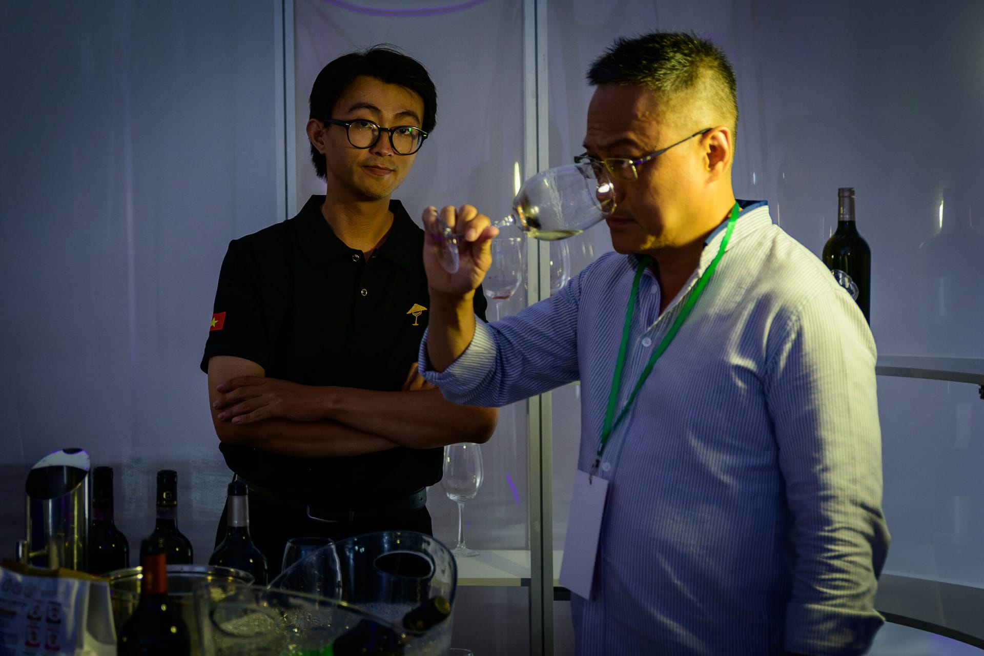 Wine tasting at an exhibitor booth during the Women in Drinks networking event at Wines Experience HCMC 2026